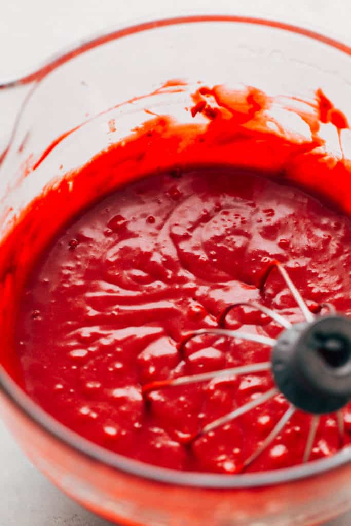 a bowl of red velvet cake batter