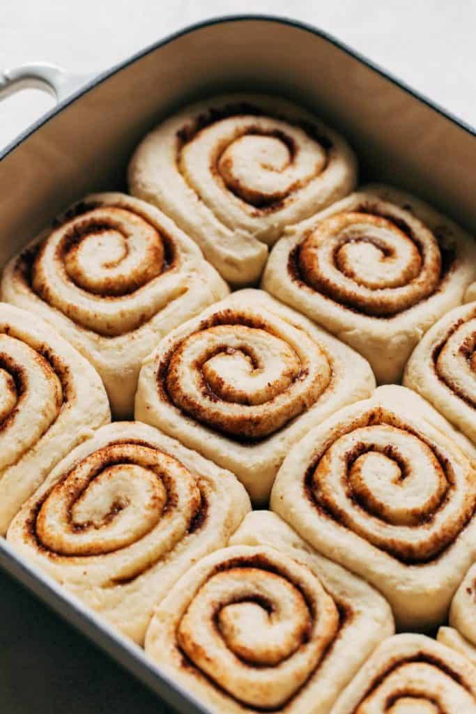 close up on proofed cinnamon rolls