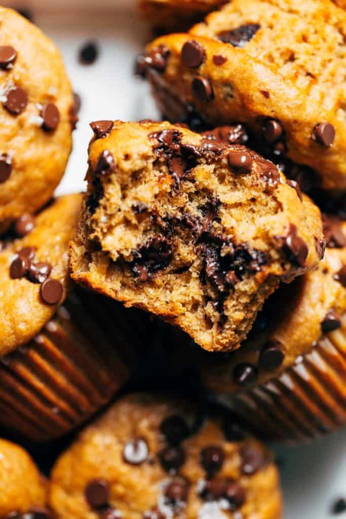 close up on a bite taken from a peanut butter banana muffin