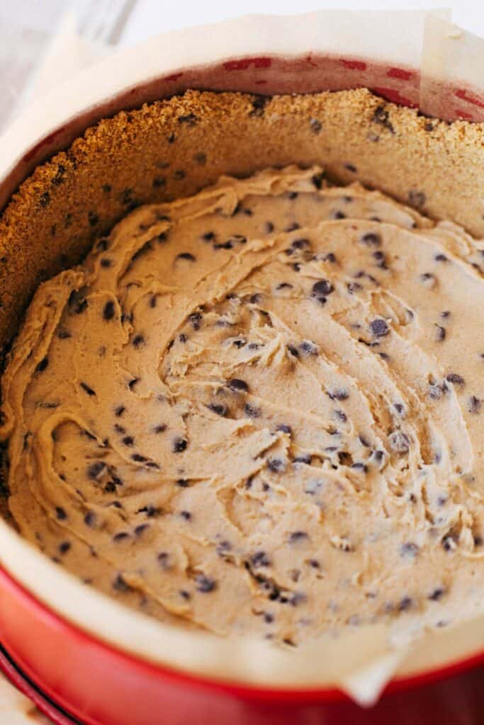 cookie dough spread in a graham cracker crust